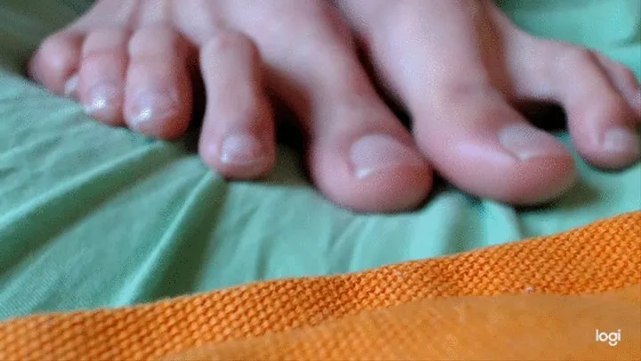 Polishing toenails to cam in close up