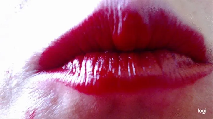 My red lips with lipstick in close up to cam