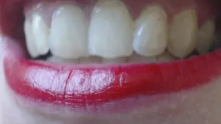 7 minutes my teeth and red lipstick on