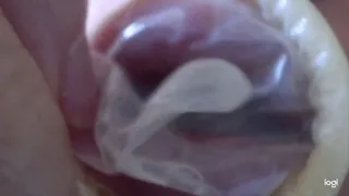 My tongue I put in condom latex