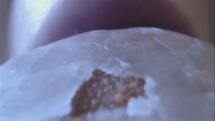 Eating yummi donut in big close up on my mouth