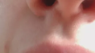 eating peach in close-ups to cam