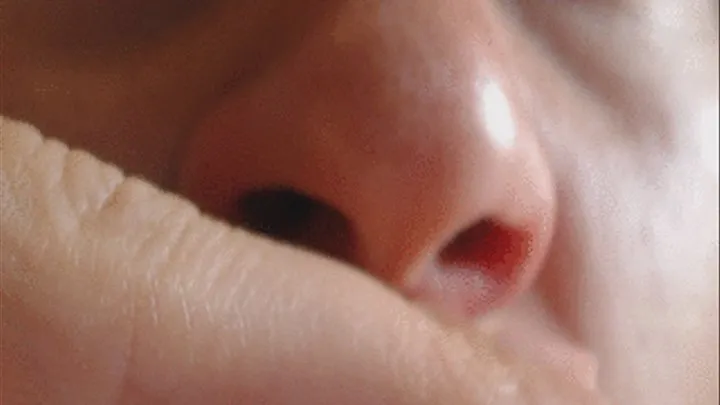 Smelling fingers in close up to cam