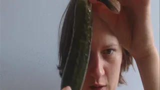 Amateur licking cucumber to cam