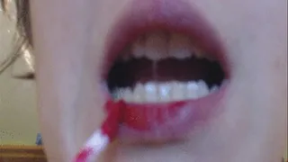 38 minutes of video with teeth and red glossy lipstick