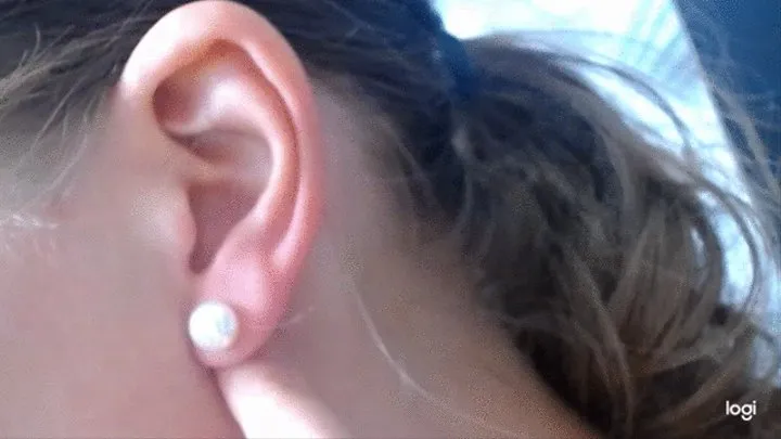 Ear with pearl earing to cam