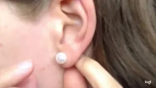 I put earring in front and back in to the hole in the ear