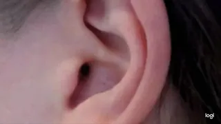 Ear in close up to cam