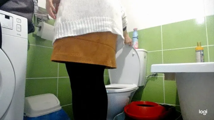 I am doing things on toilet in skirt and tights