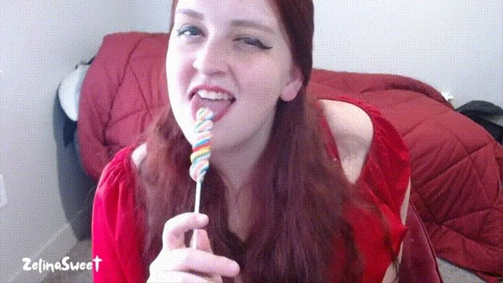 Licking a lollipop