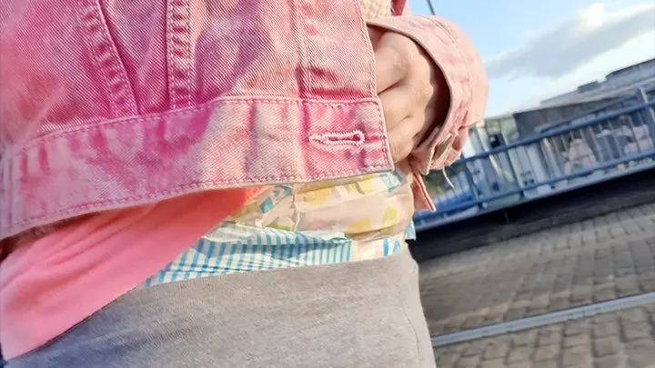 Wet Barebum diaper walk through the city