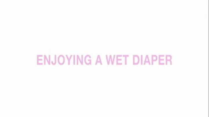 Enjoying a wet diaper