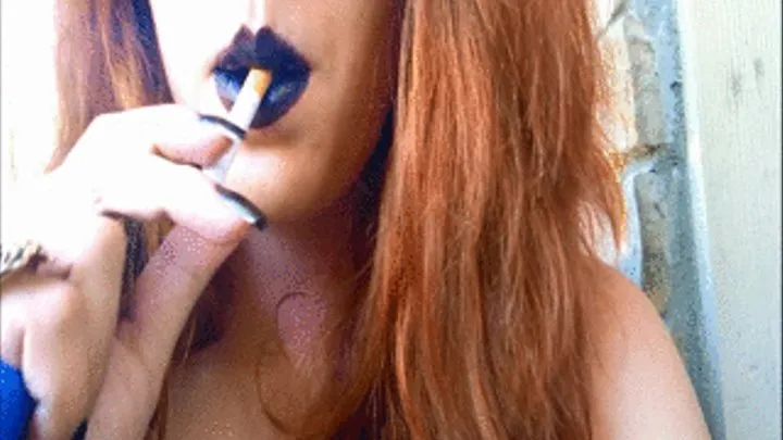 Sexy Goth Redhead Smoking a Red Cigarette