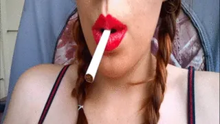 Sexy Redhead with Braid Smoking a Cigarette