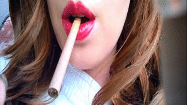 Sexy Pale Redhead with Red Lips Smoking