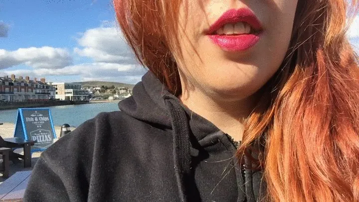 Sexy Redhead Babe Smoking in Public at the Beach - Big Pink Lips