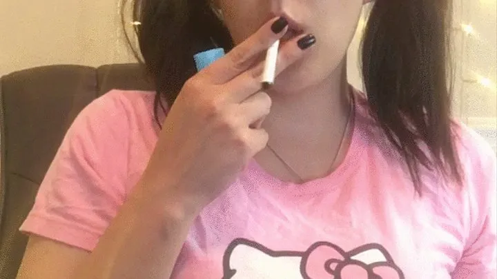 Nerdy Babe With Pigtails Smoking Marlboro Light 100 in Hello Kitty Shirt