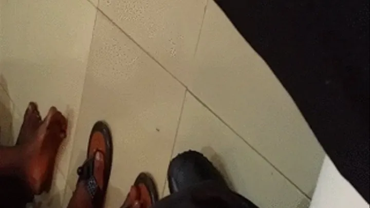 Ebony Feet Barefoot on Floor in Nii's Office