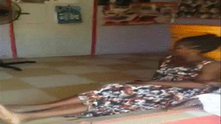 Baaba Hairstylist Sits on Floor in Beauty Salon & Crosses Dirty Soles