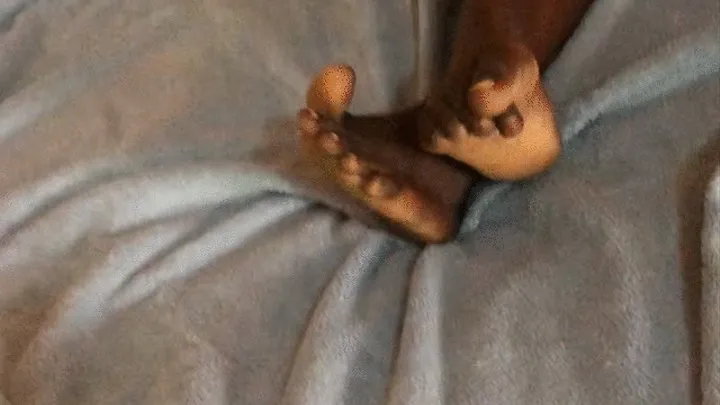 Skinny Dark Skinned Chick's Soles From Behind, Crossed & On Top of 1 Another