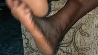 Maid Northerner Haija's Juicy, Wrinkled Soles Crossed On Couch