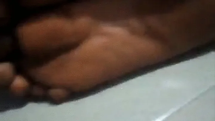 Maame Ice Dokunu Wura's Wrinkly, Meaty Soles From Side While Lying On Floor Pt 2 ( Soles Crossed)