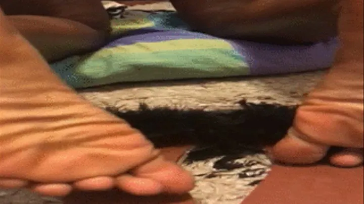 Asante Yaa's Wrinkly Ebony Soles On Top of Slippers