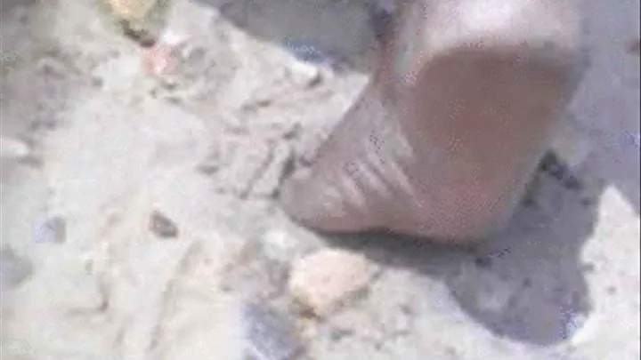 Zoomlion Cleaner Barefoot On Beach Showing Wrinkly Soles