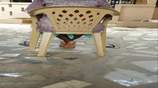 Mango Seller Sitting Down With Ebony Soles From Behind