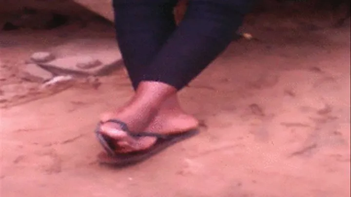 Adjoa's Ebony Feet in Flip Flops