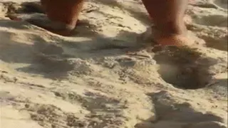 Papistimol Walks Barefoot On Beach