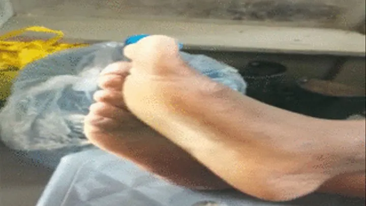 Zoomlion Cleaner's Ebony Feet & Soles Crossed at Ankles