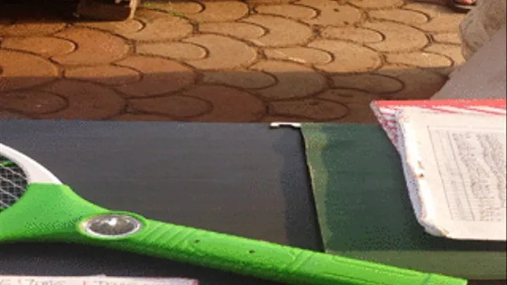 Thick Ebony Feet of Bread Seller in Flip Flops