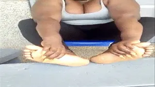 Ghana Fan Choco Obaa Massages Soles On Table