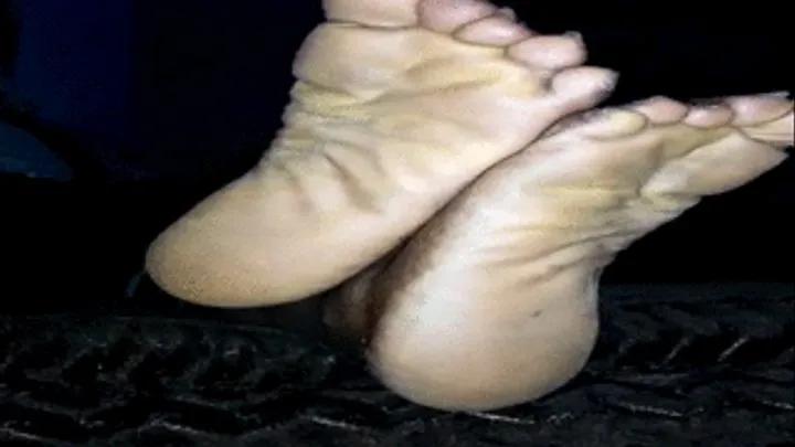 Akweley's Ga Soles Crossed at Ankles