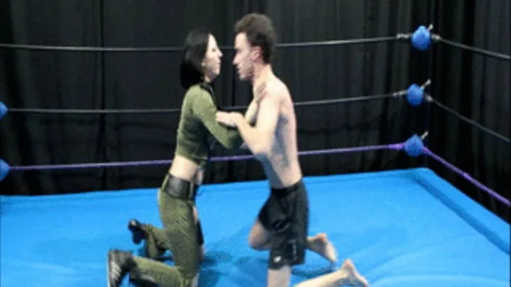 Military style superheroine wrestles