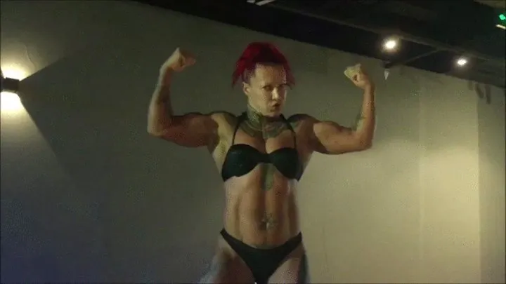 Belorussian fem bodybuilder poses, lifts, works out