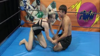 Sporty blonde in one piece bikini wrestles competitively