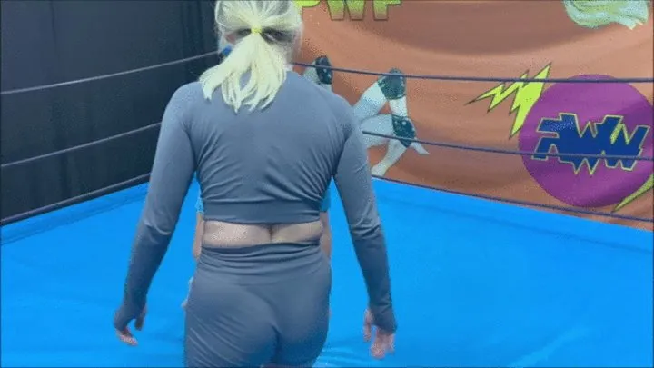 Blonde fem wrestler wrestles competitively