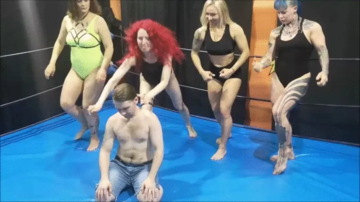 2 muscular girls and 2 female wrestlers tie up a guy in a match part 2 (young guy)