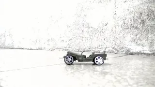 Military toy car crushing
