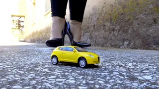 Crushing the yellow toy car