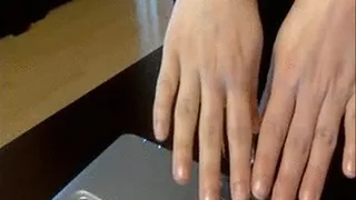 Red nail polish on beautiful hands