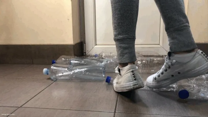 CRUSHING PLASTIC BOTTLES IN HER CONVERSE SNEAKERS