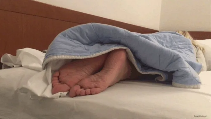 SMALL SOLES UNDER BLANKET