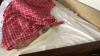 BIG FEET UNDER BED SHEETS STICKING OUT