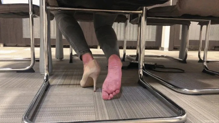 ONE SHOE HOPPING AROUND OFFICE