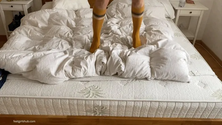 JUMPING ON THE BED IN KNEE HIGH SOCKS AND PANTIES
