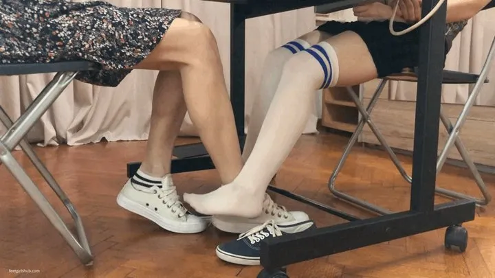 SEXY STUDENTS FOOTSIE UNDER LIBRARY TABLE