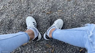 TAKING OFF SOCKS AND SNEAKERS IN PUBLIC PARK